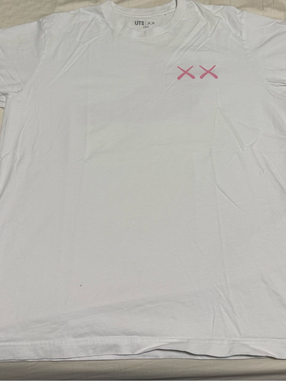 KAWS White Short-Sleeve Tee with Pink XX Chest Graphic